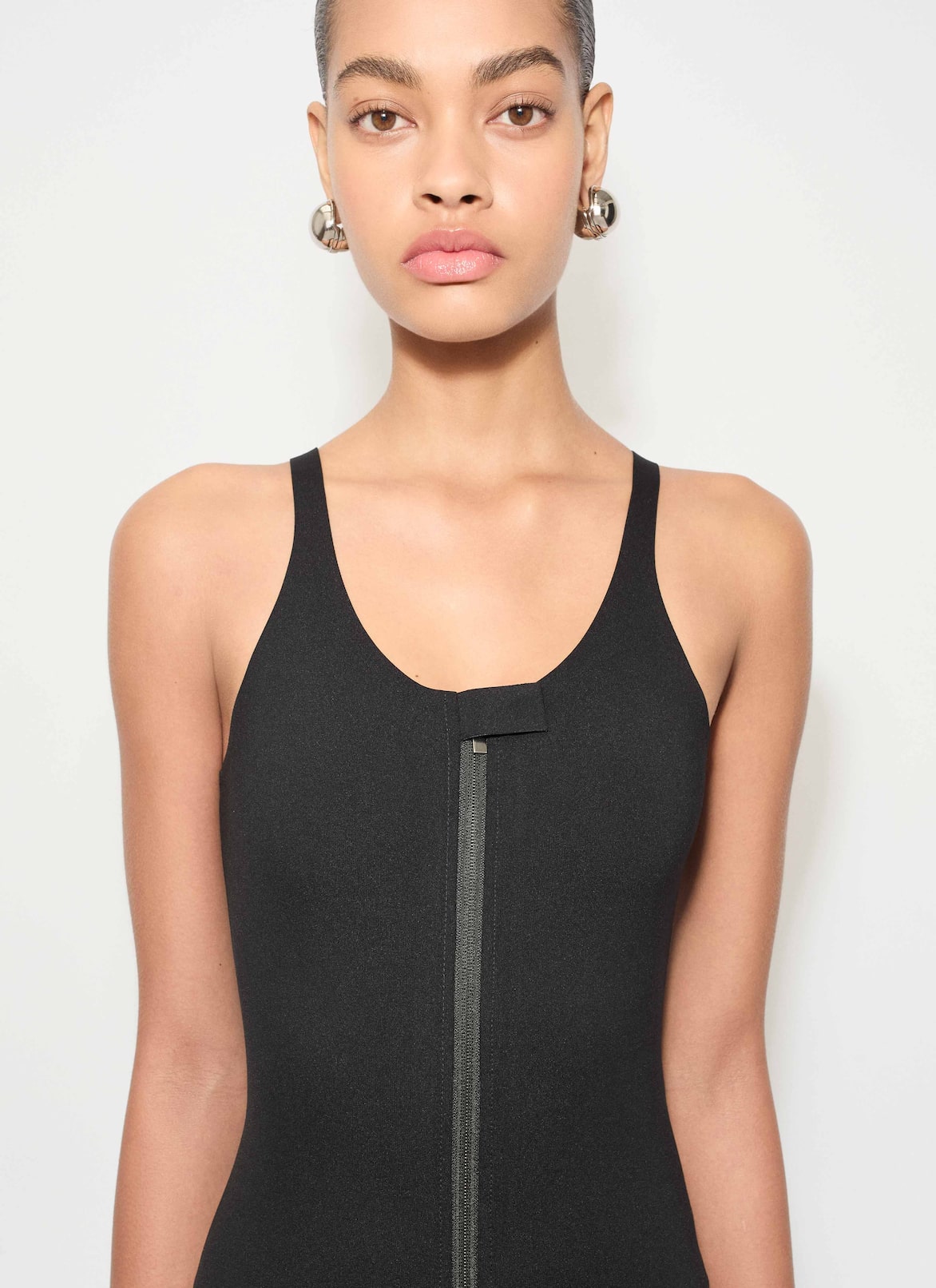 COMPACT JERSEY TECHNICAL JUMPSUIT ALAÏA BLACK COMPACT JERSEY TECHNICAL JUMPSUIT